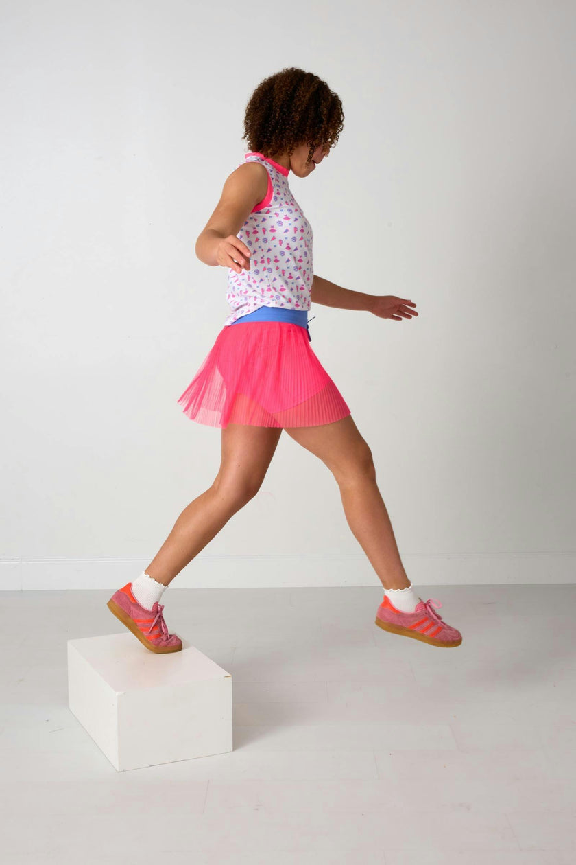 neon pink pleated skort