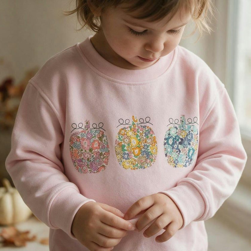 Liberty of London children's pumpkins design pale pink jumper