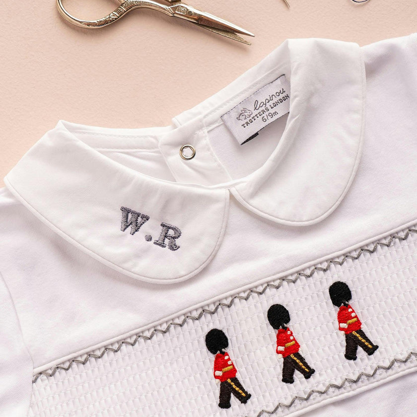 Baby Smocked Onesie in Guardsman