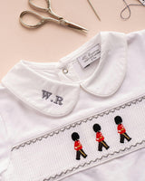 Baby Smocked Onesie in Guardsman
