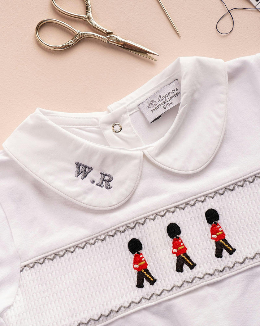 Baby Smocked Onesie in Guardsman