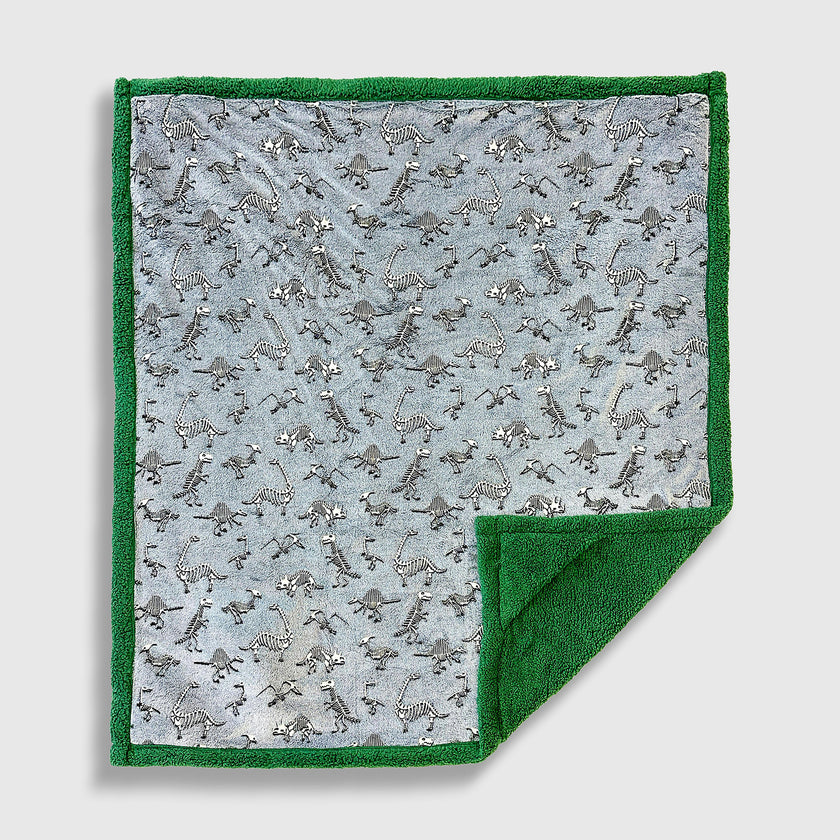 Cozy Switch Blanket – Reversible Sherpa & Glow-in-the-Dark Blanket with Plush Toy Pocket, Glow Dino Bones
