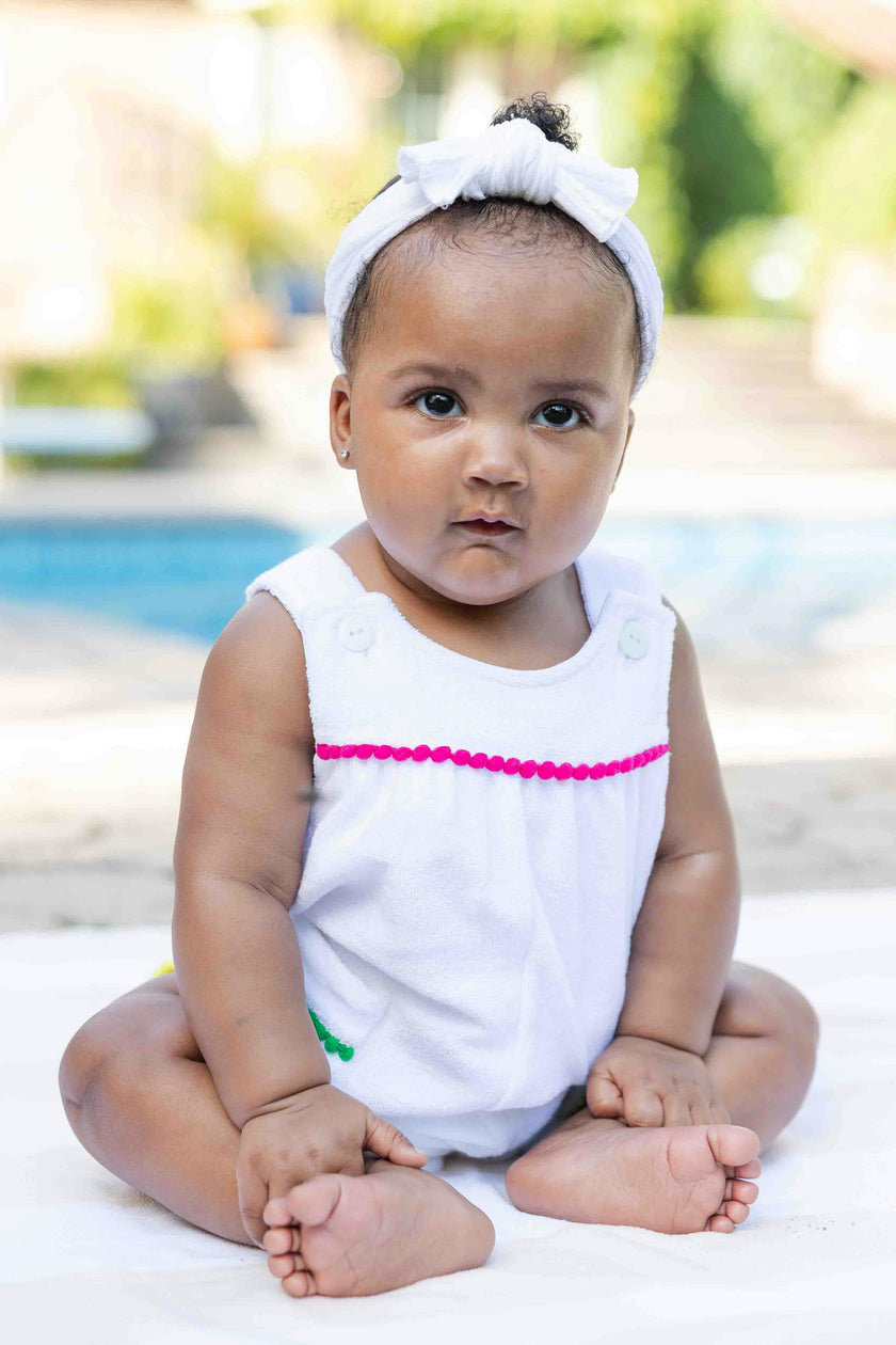 Terry Romper With Pom Poms