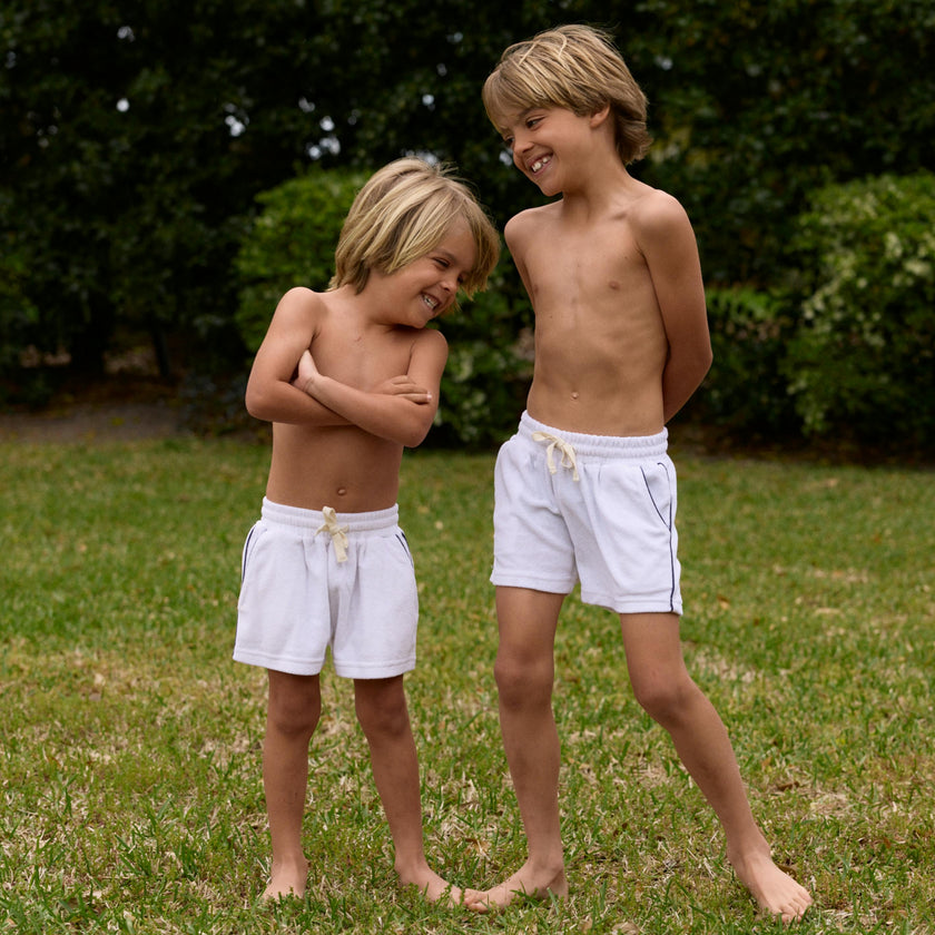 boys white french terry short with navy side piping