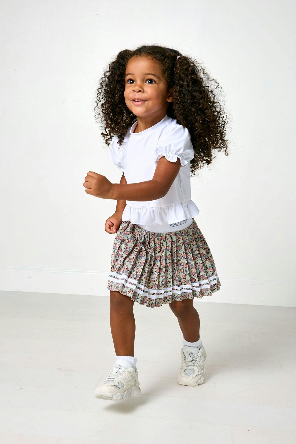 white ruffle tee