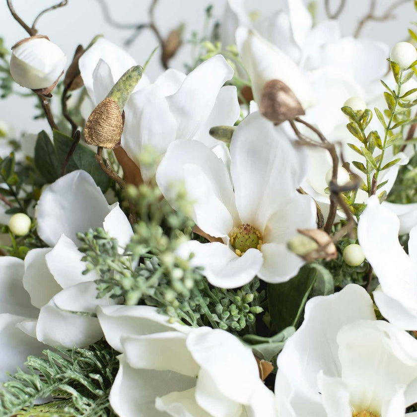 Winter White Magnolia, Pine & Snowberry Christmas Arrangement Centerpiece in Antiqued Silver Metal Urn