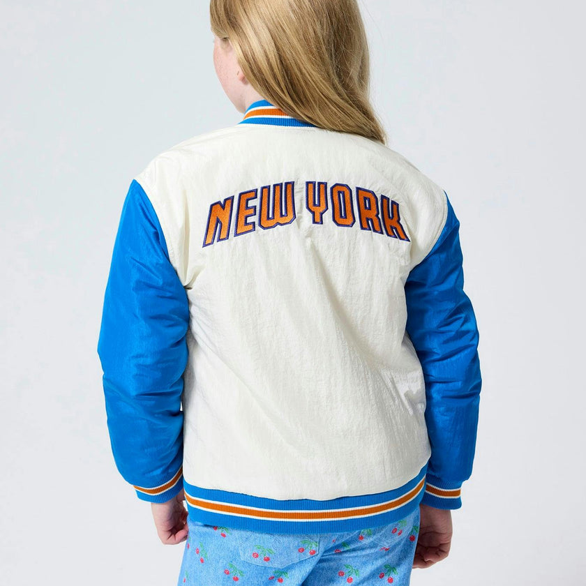 New York Knicks Basketball Youth Bomber Jacket in Sugar Swizzle and Blue
