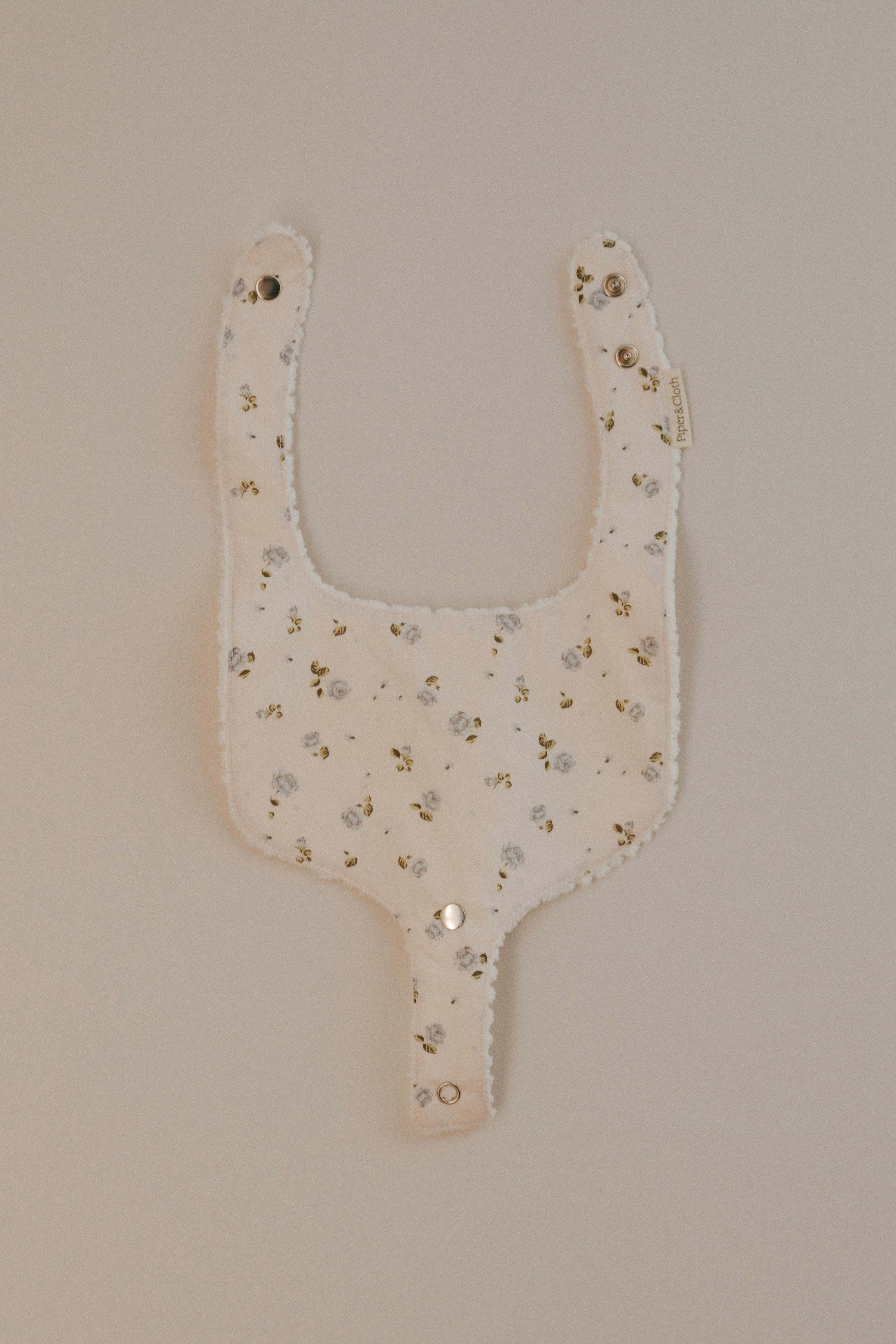 Soothe & Snap Pacifier Bib- Rosemilk Bloom