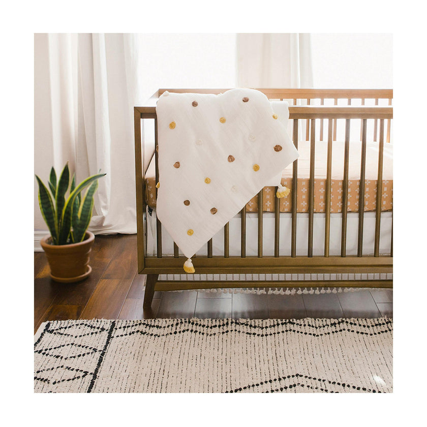 Kendi Cotton Muslin Pom Pom Baby Quilt