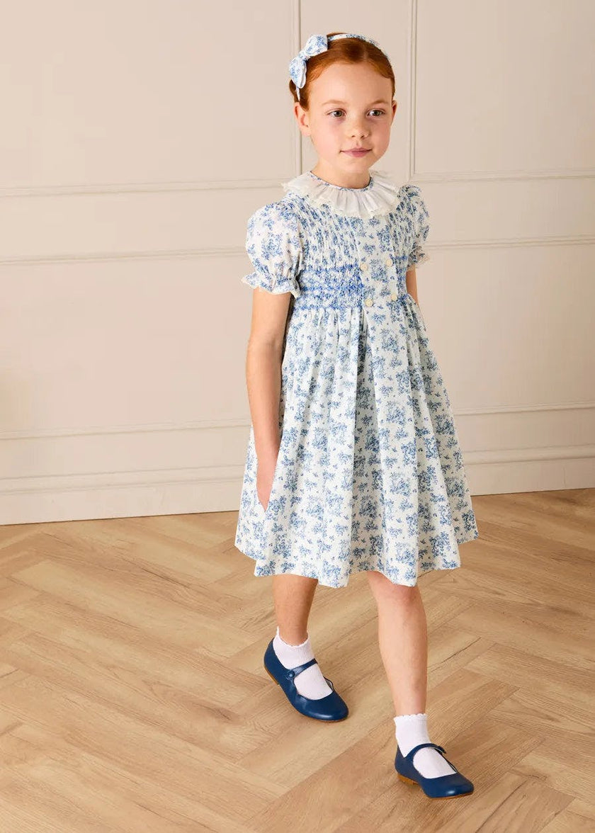 Audrey Toile Hand Smocked Ruffle Collar Short Sleeve Dress in Blue (12mths- 10yrs)