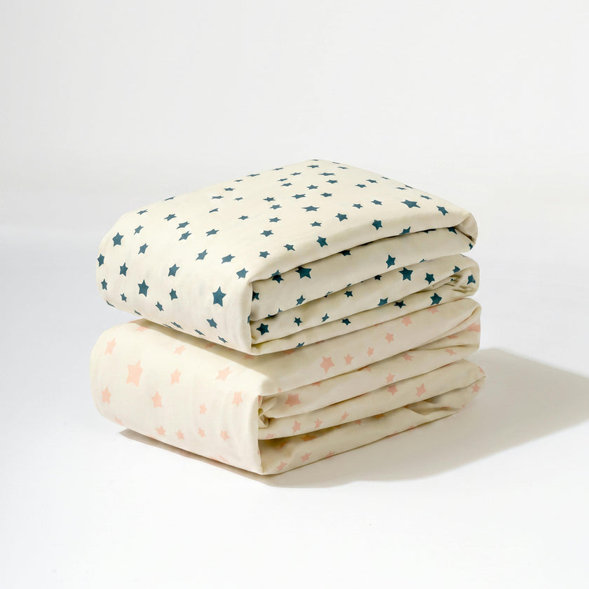 Crib Sheet in GOTS Certified Organic Brushed Cotton in Ivory with Navy Stars