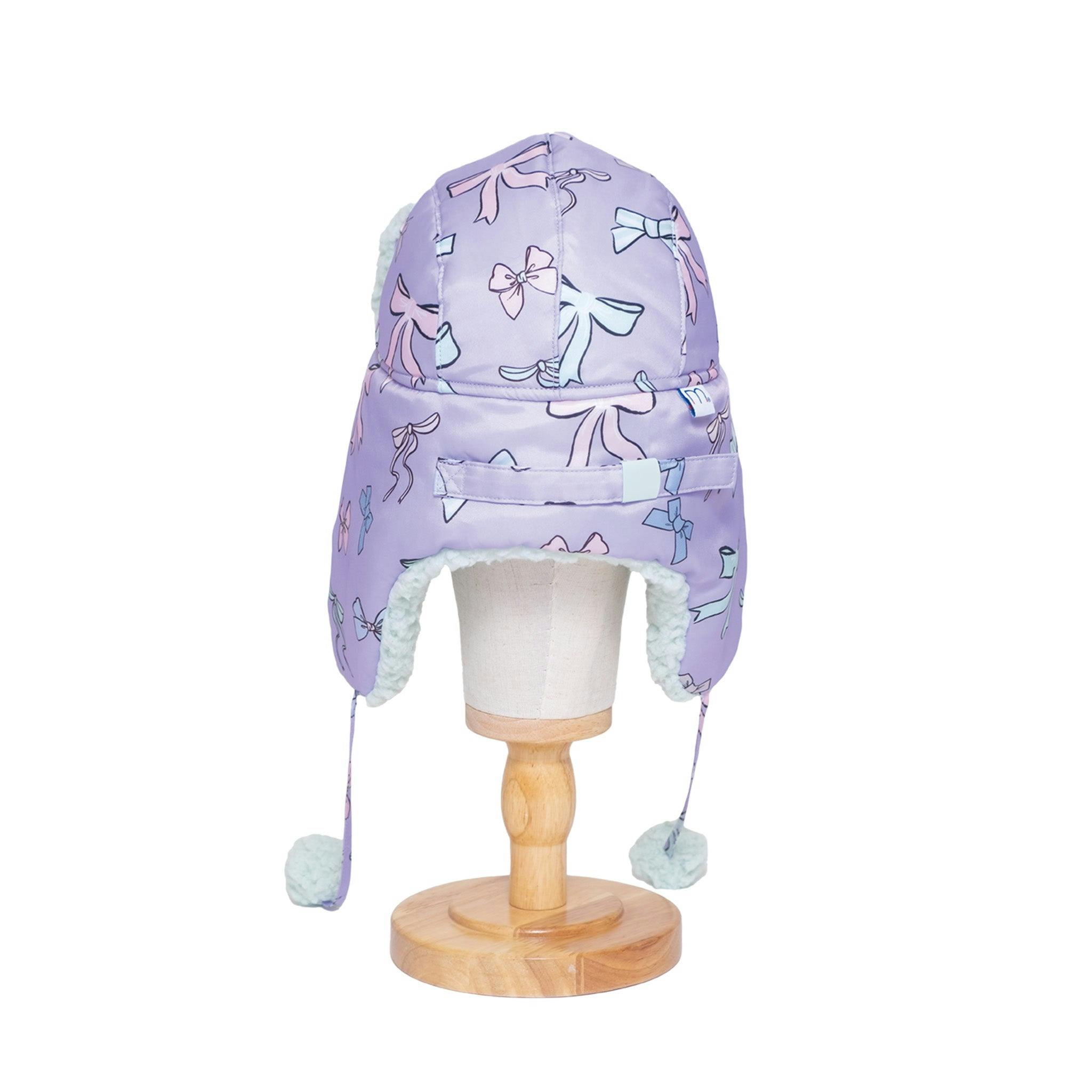 The Cozy Trapper Hat – Bows Print with Pale Aqua Sherpa Liner & Pompoms