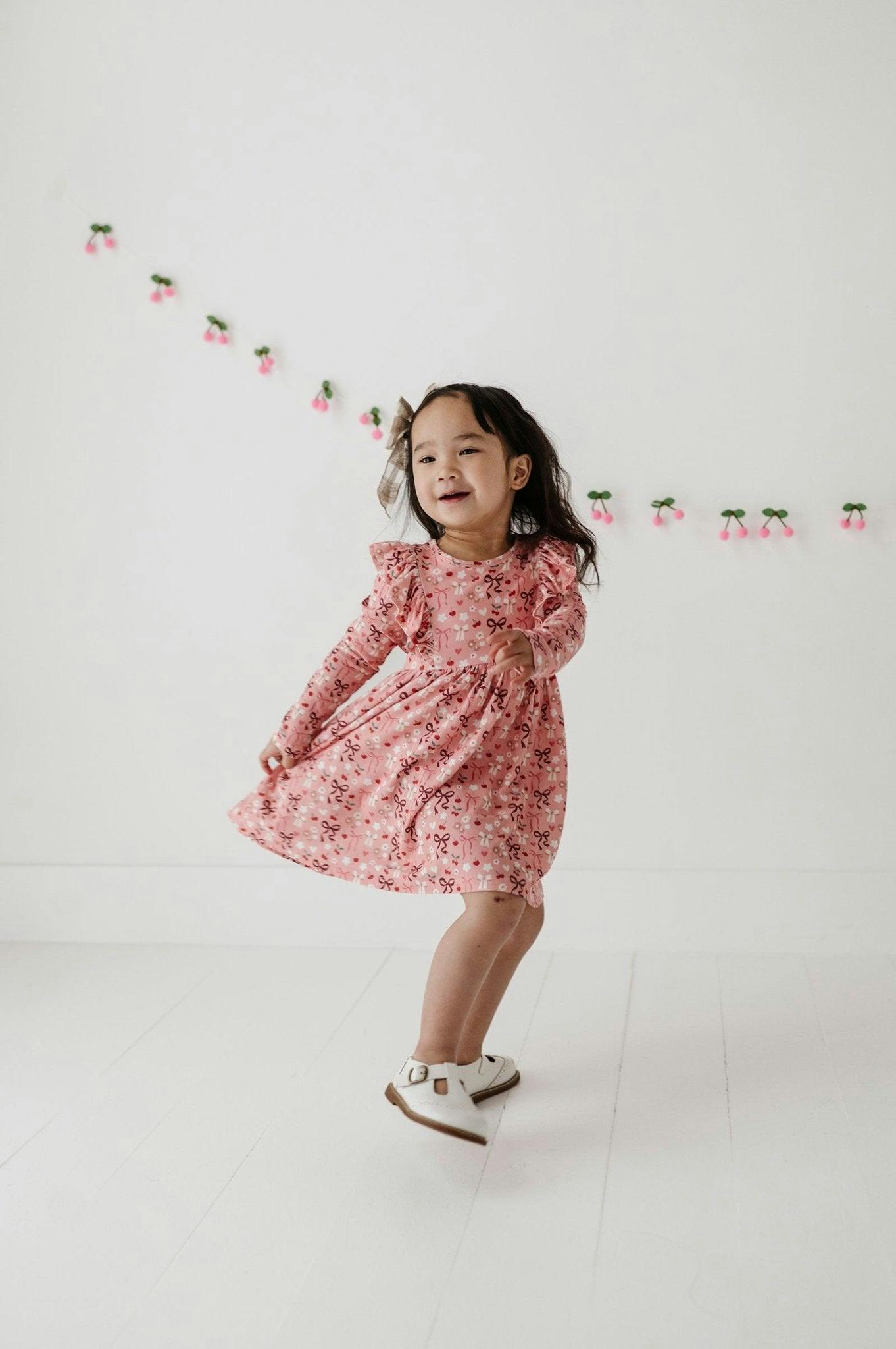 Girls Long Sleeve Ruffle Dress in Cherry Hearts