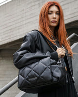 Nova Eco Compact Changing Bag Black Quilted Faux Leather