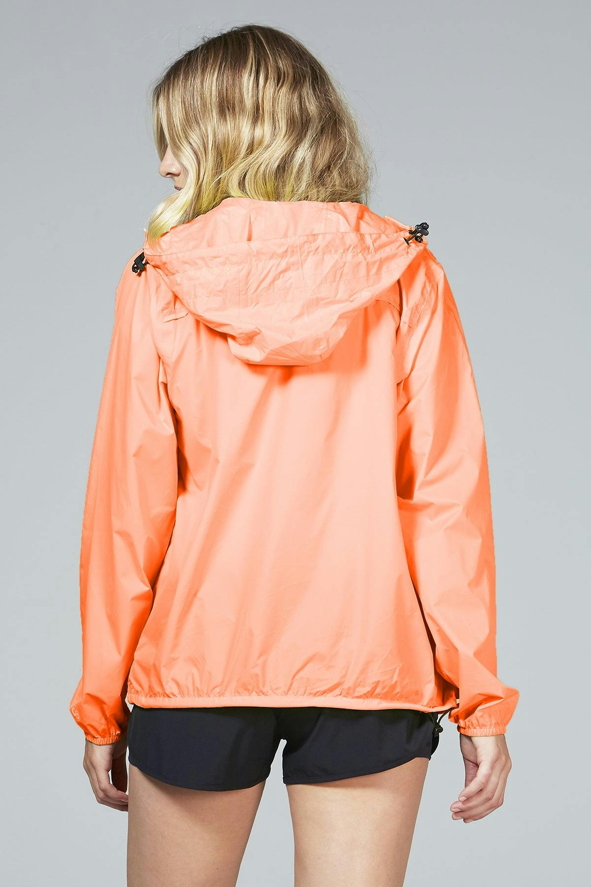 Orange fluo full zip packable rain jacket and windbreaker