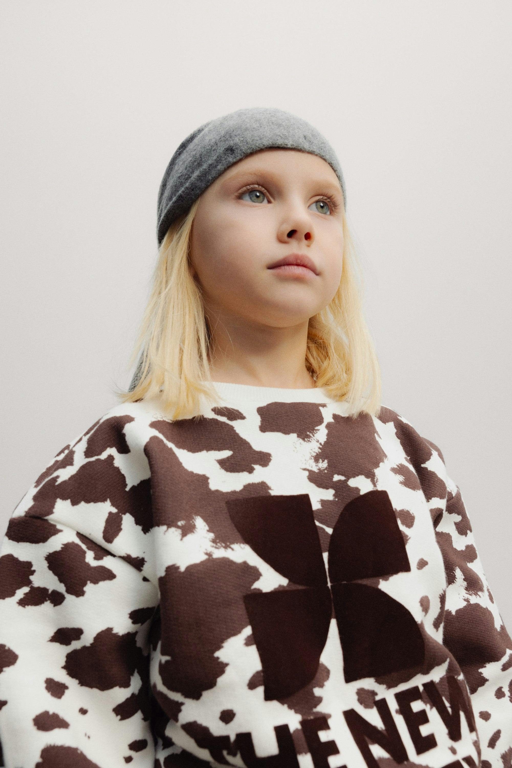 TNS Logo Sweatshirt Cow Print