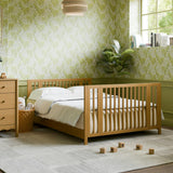 Rolli 9-in-1 Convertible All-Stages® Crib with Bassinet & Toddler Bed Conversion Kits in Honey
