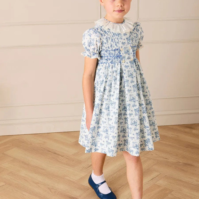Audrey Toile Hand Smocked Ruffle Collar Short Sleeve Dress in Blue (12mths- 10yrs)