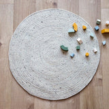 Neethu Hand-Crafted Felted Wool Round Rug, Natural