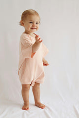 Cory Pocket Romper in Peach Powder