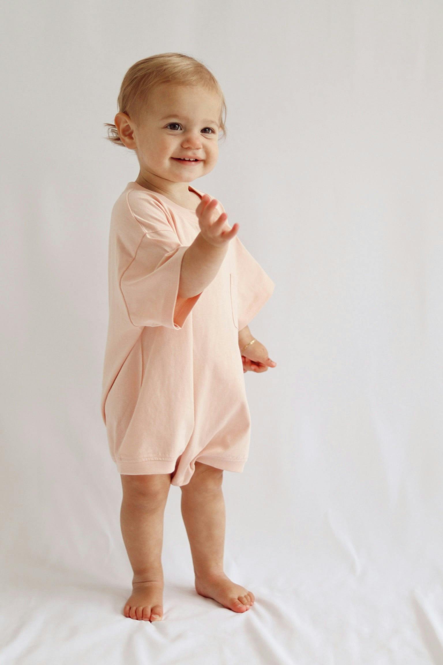 Cory Pocket Romper in Peach Powder