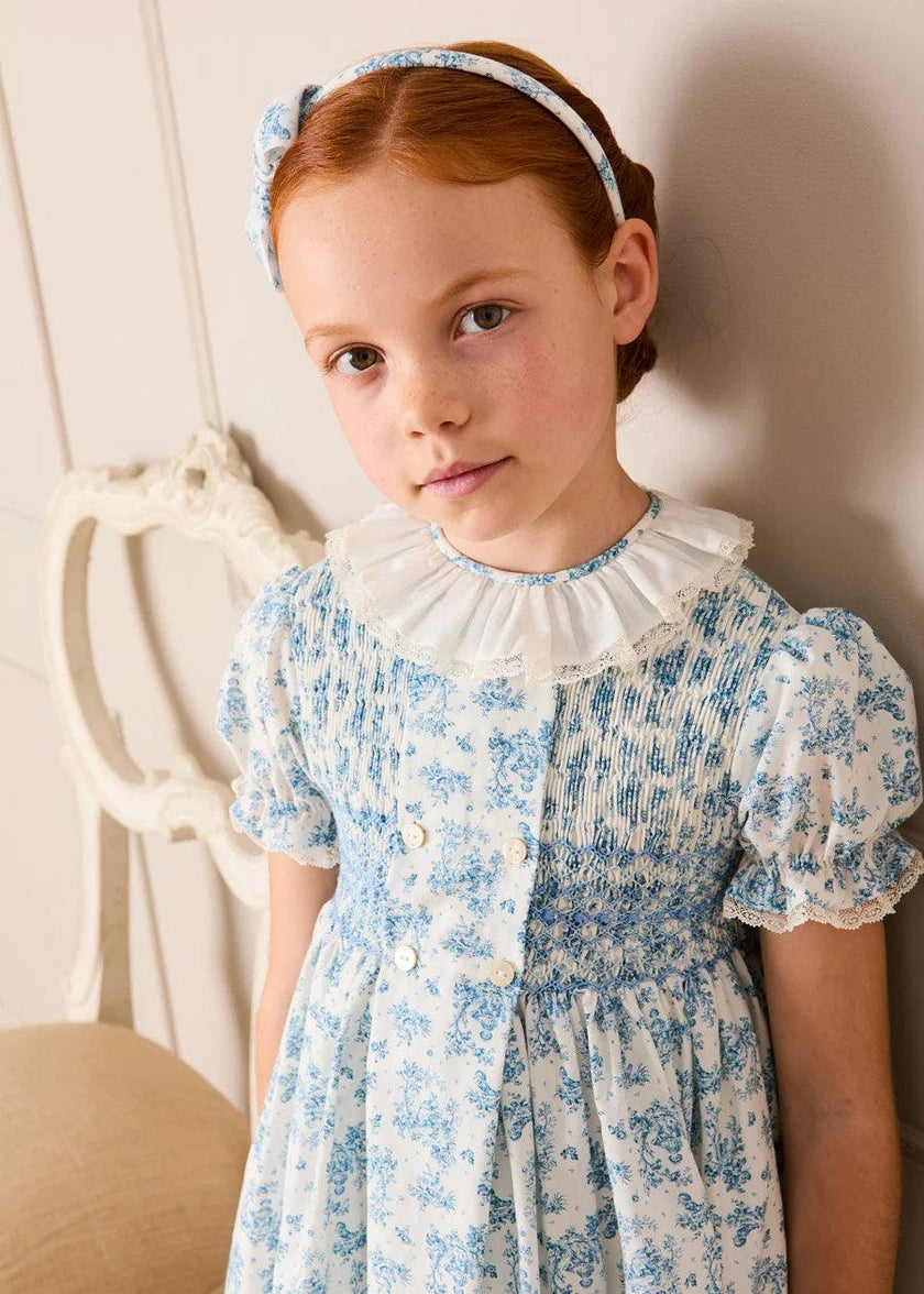 Audrey Toile Hand Smocked Ruffle Collar Short Sleeve Dress in Blue (12mths- 10yrs)