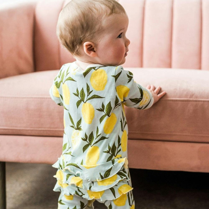 Valais Bamboo Ruffle Zipper Footed Romper