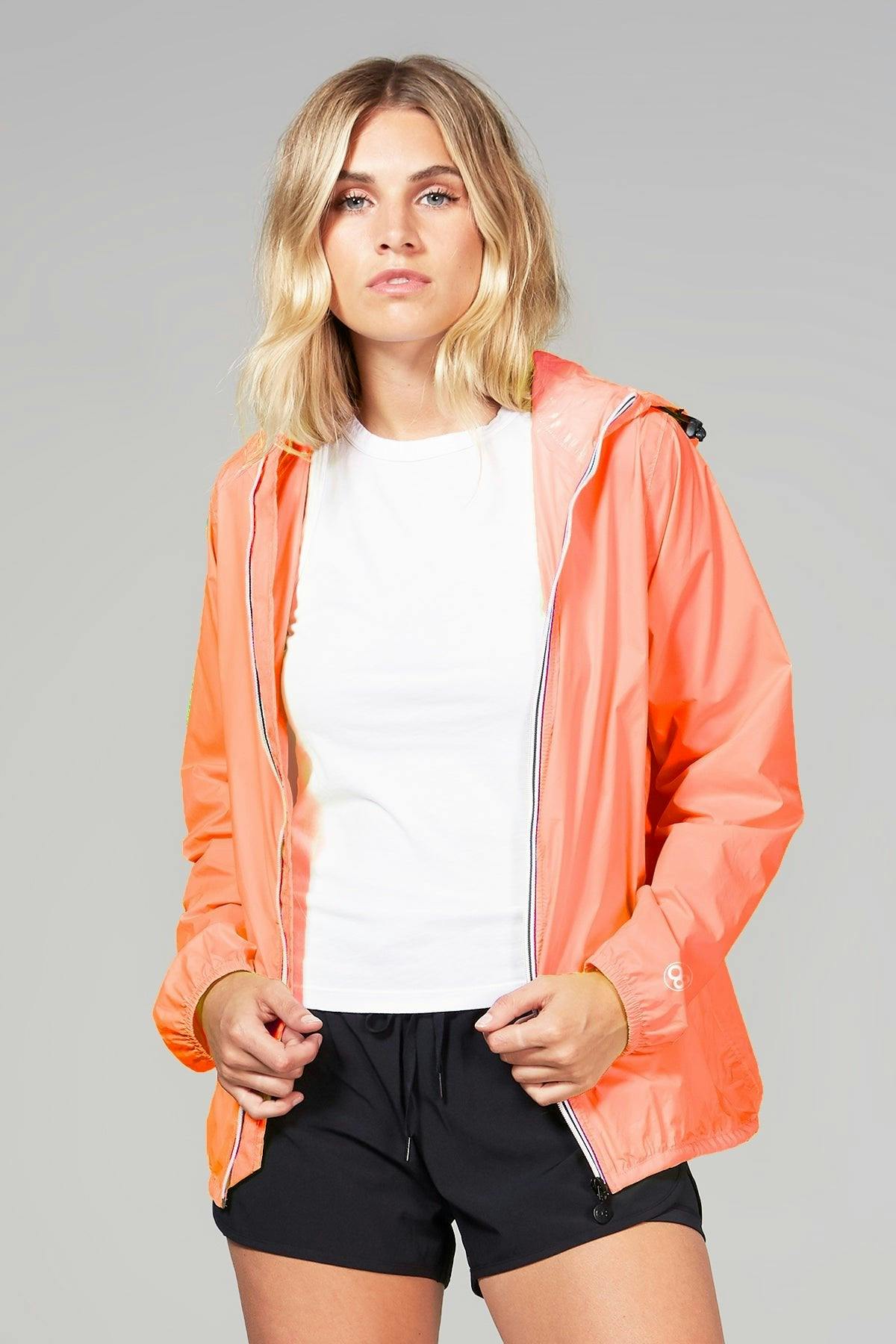 Orange fluo full zip packable rain jacket and windbreaker