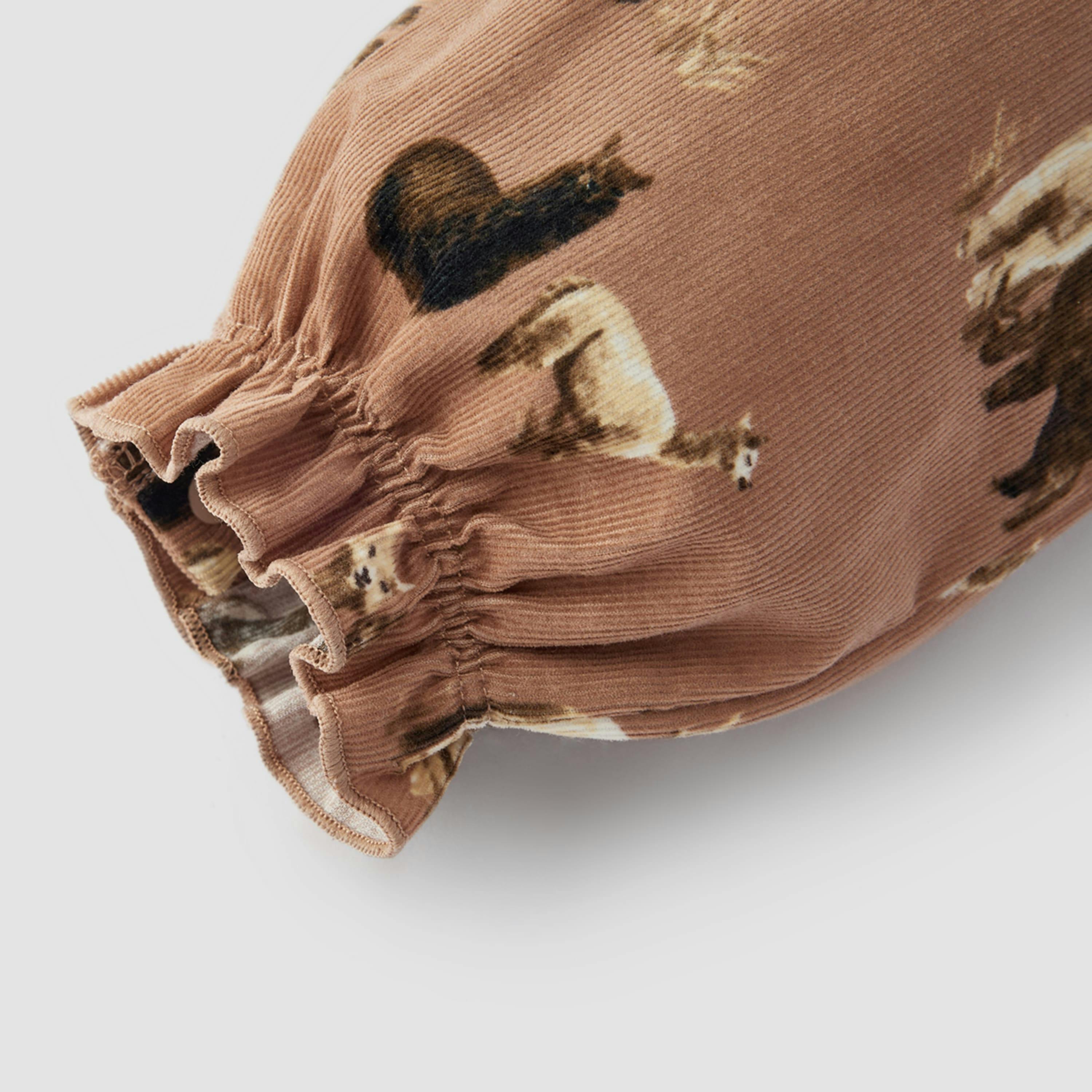 Corduroy Ruffle Snap Jumper