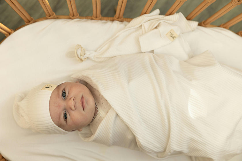 Gift Boxed Ribbed Textured Swaddle, Beanie, and Lovie Three Piece Set