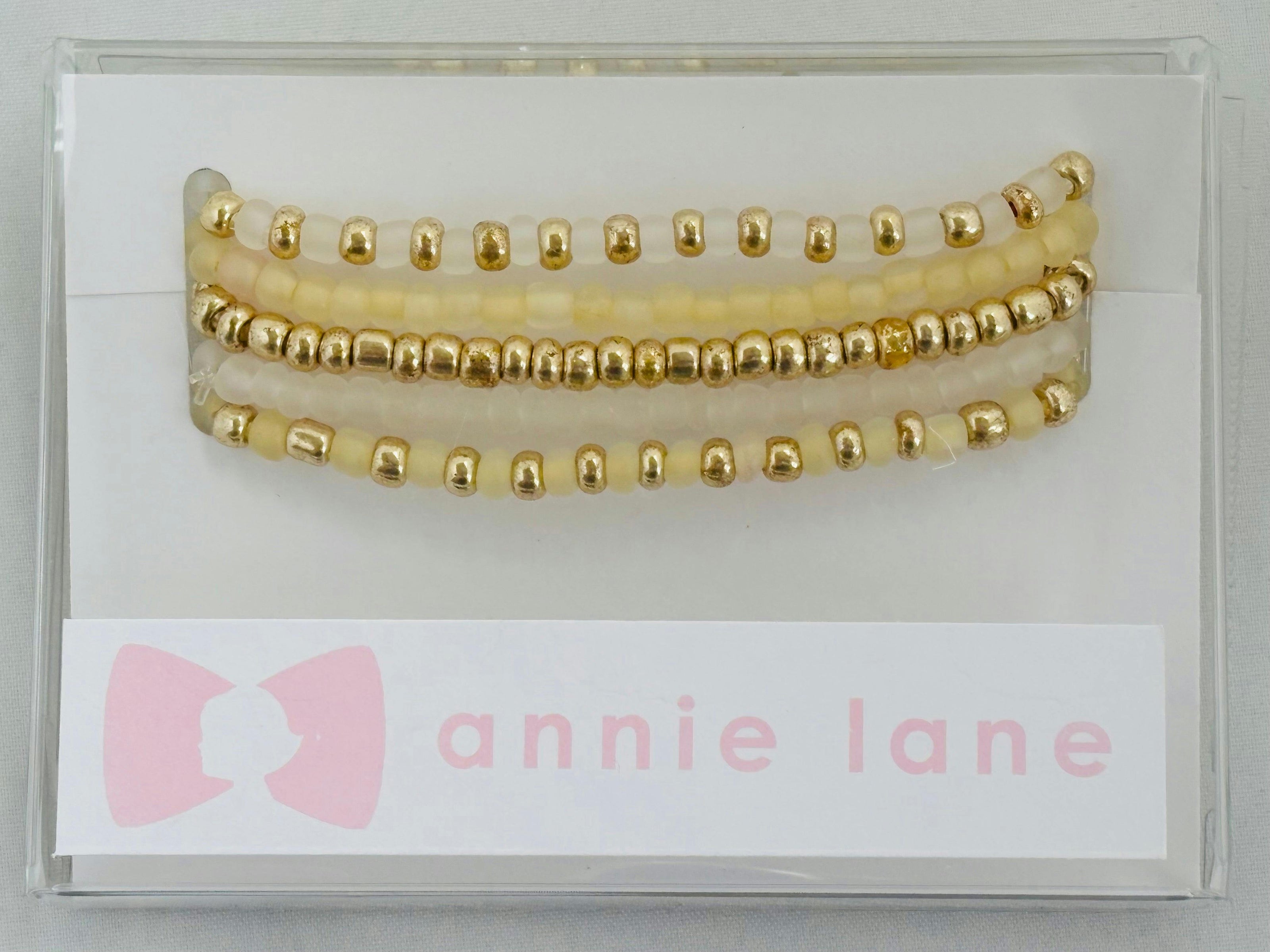 Gold set of five bracelets