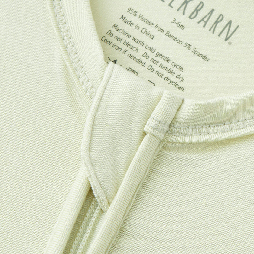Aloe Luxe Solid Zipper Footed Romper