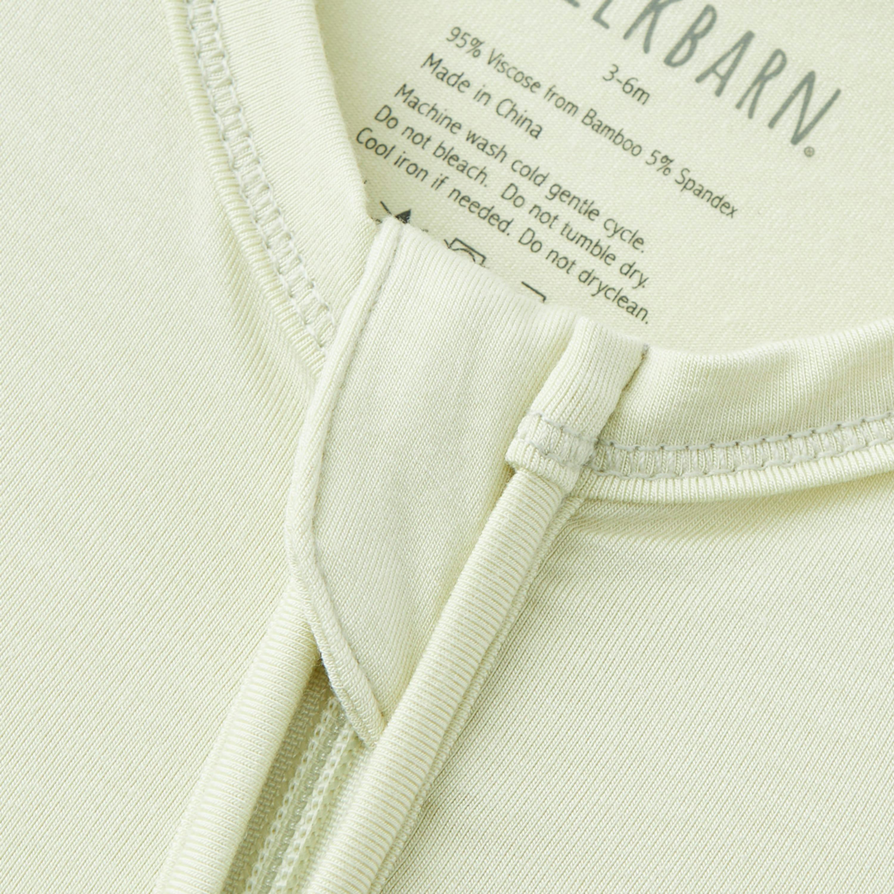 Aloe Luxe Solid Zipper Footed Romper