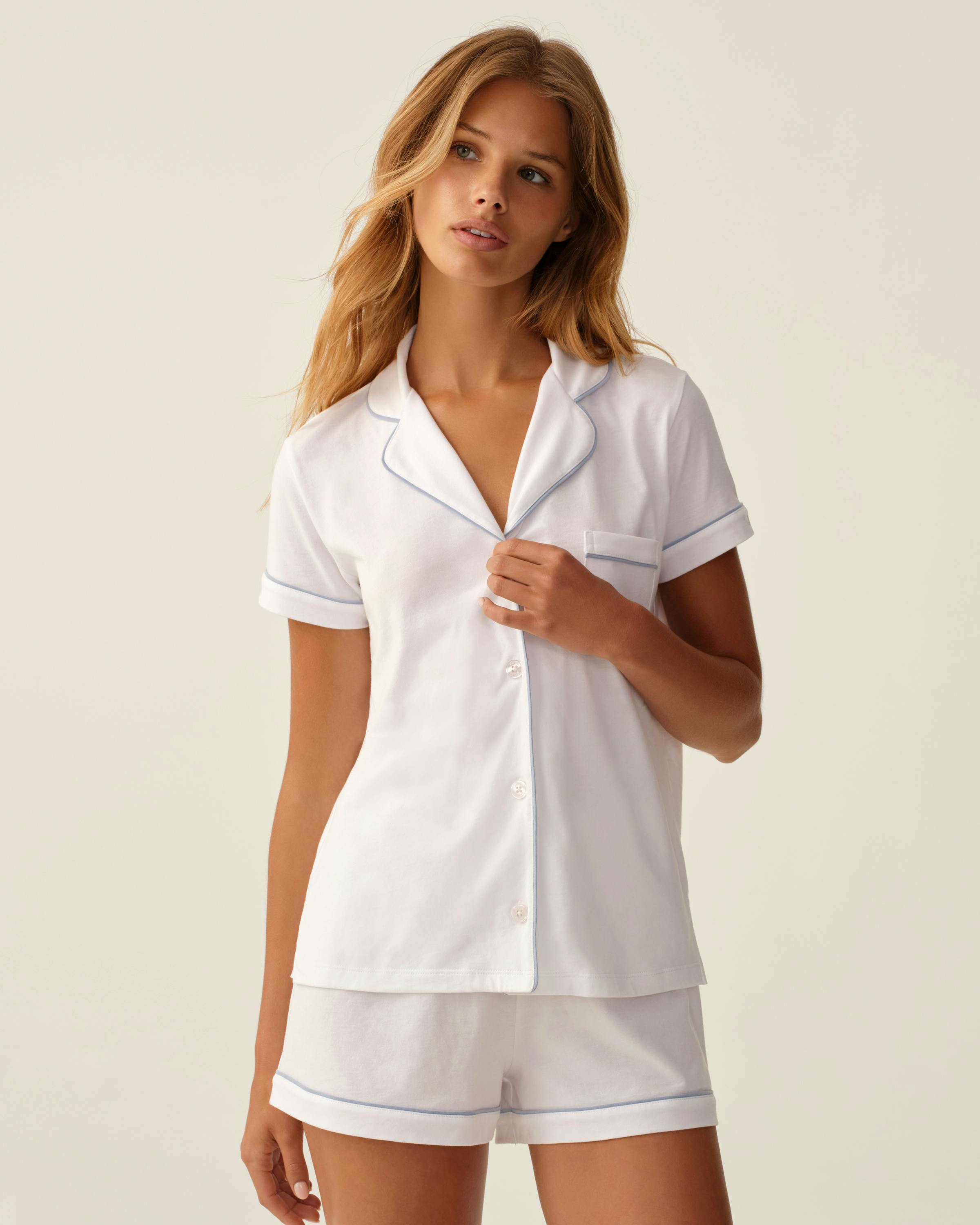The Poppy Pima Short Set in White with Periwinkle Piping