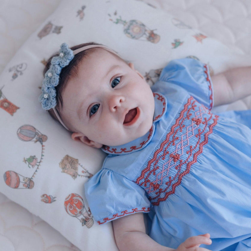 Princess Charlotte Sky Blue Smocked Baby Romper