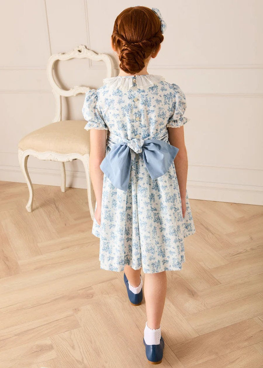 Audrey Toile Hand Smocked Ruffle Collar Short Sleeve Dress in Blue (12mths- 10yrs)