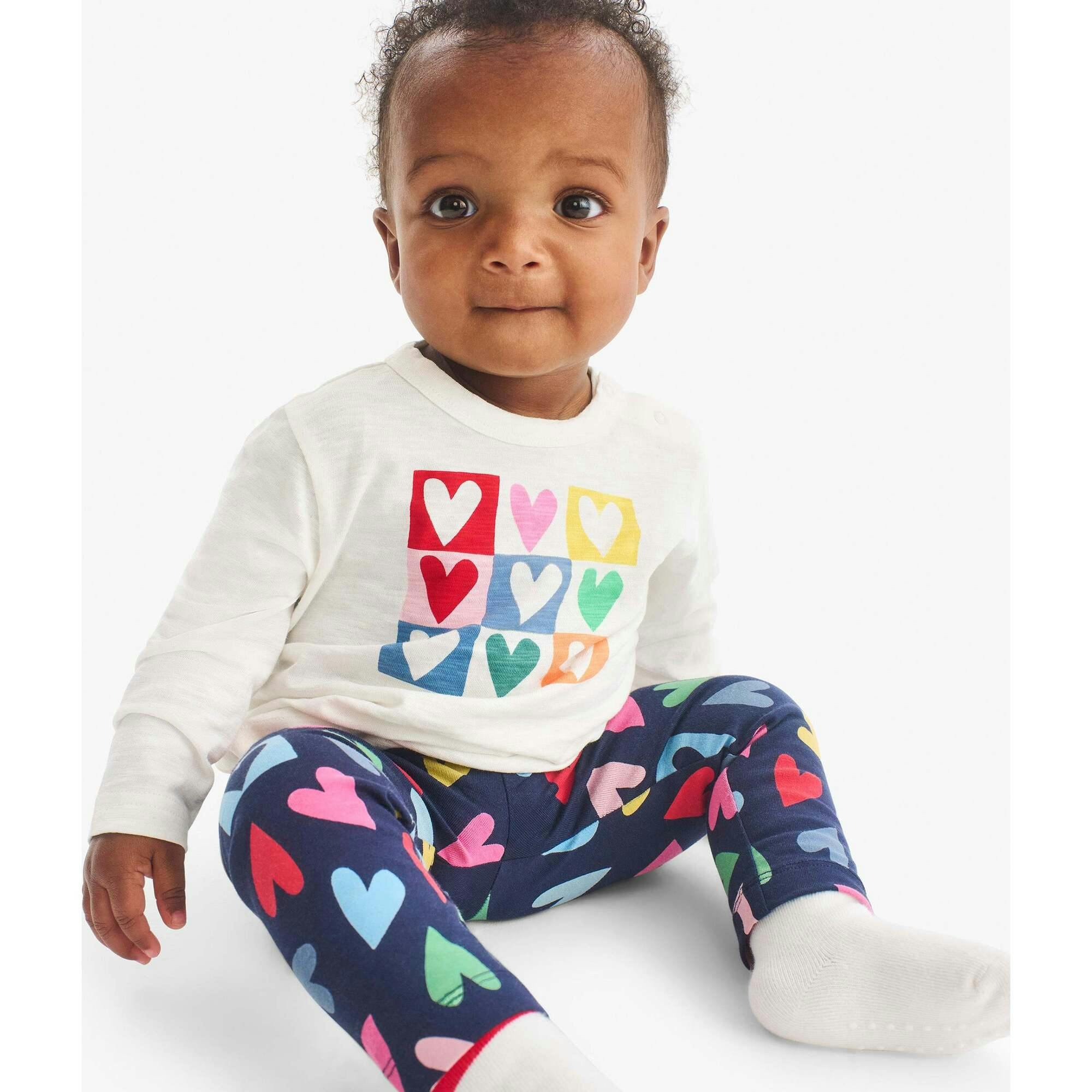 Baby legging in rainbow candy hearts