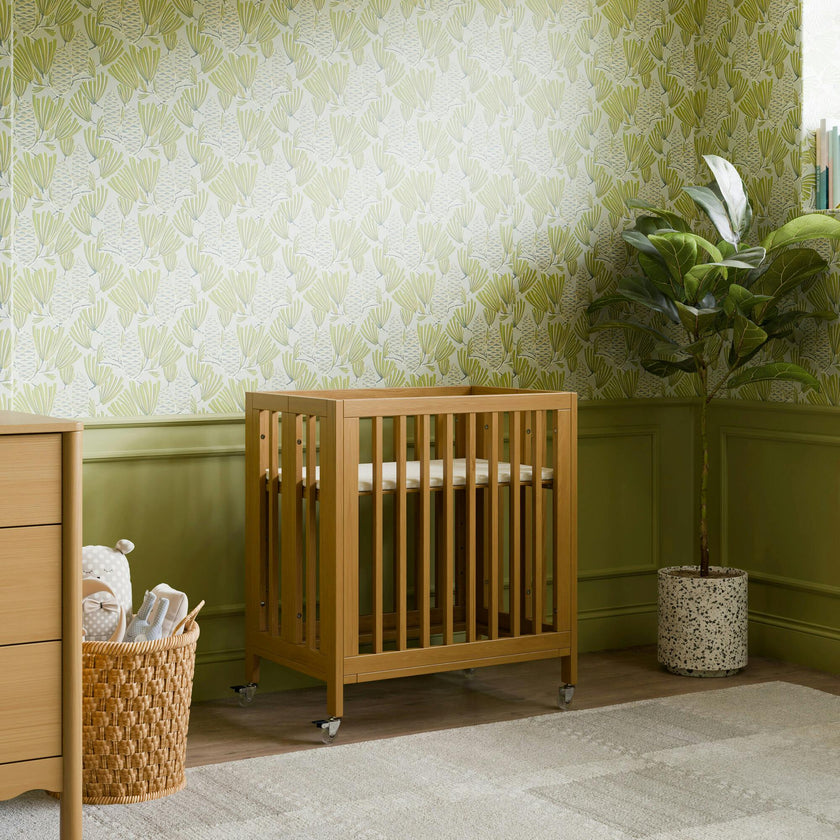 Rolli 9-in-1 Convertible All-Stages® Crib with Bassinet & Toddler Bed Conversion Kits in Honey