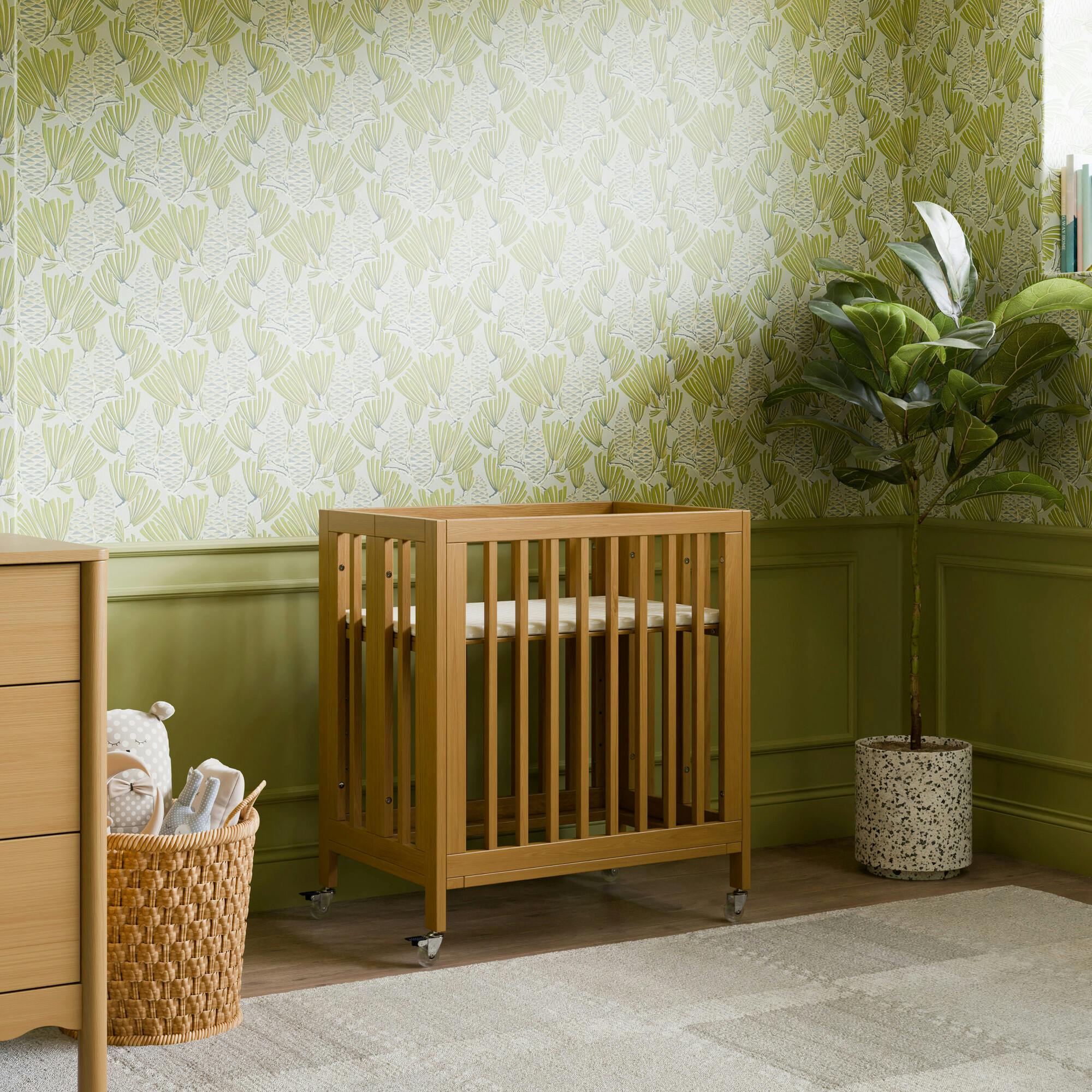 Rolli 9-in-1 Convertible All-Stages® Crib with Bassinet & Toddler Bed Conversion Kits in Honey