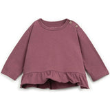 Ruffle Pelum Hem Long Sleeve