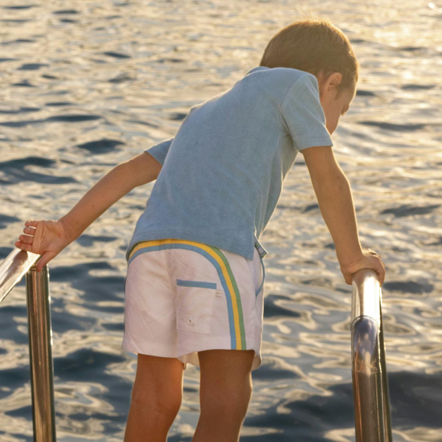 boys shell white boardie with multi stripes