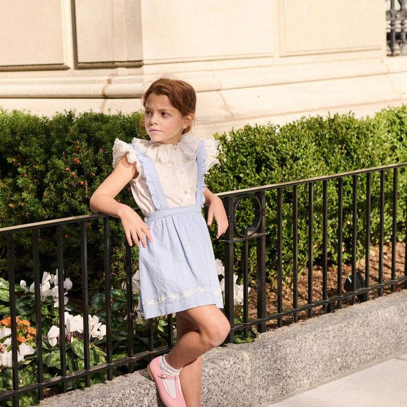 Nicky Hilton x La Coqueta Ivory Bow Olivia Girl Shirt