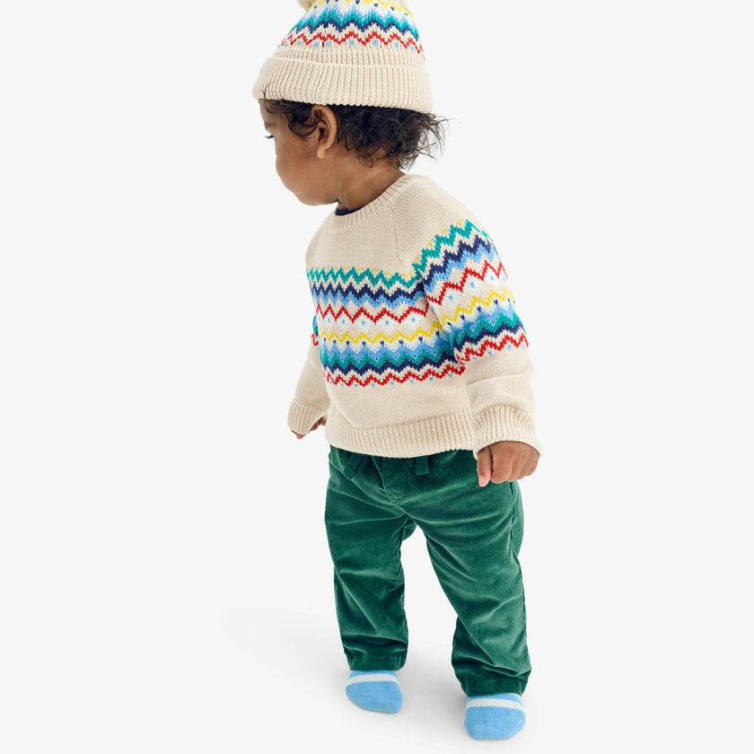 Baby sweater in rainbow fair isle