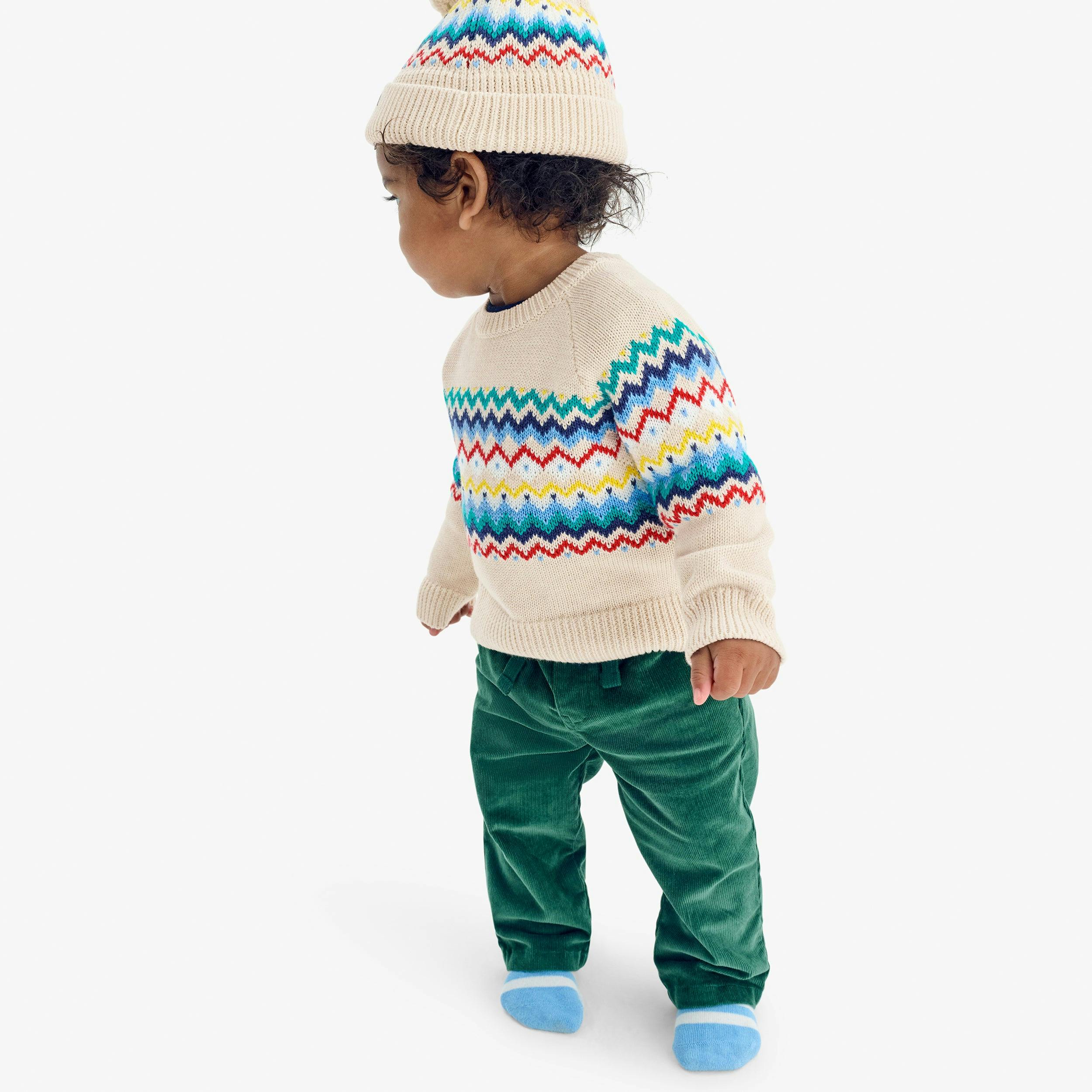 Baby sweater in rainbow fair isle