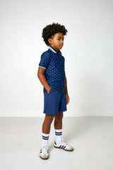 navy polka dot polo shirt