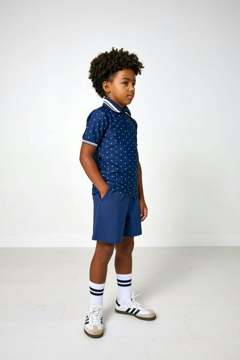 navy polka dot polo shirt