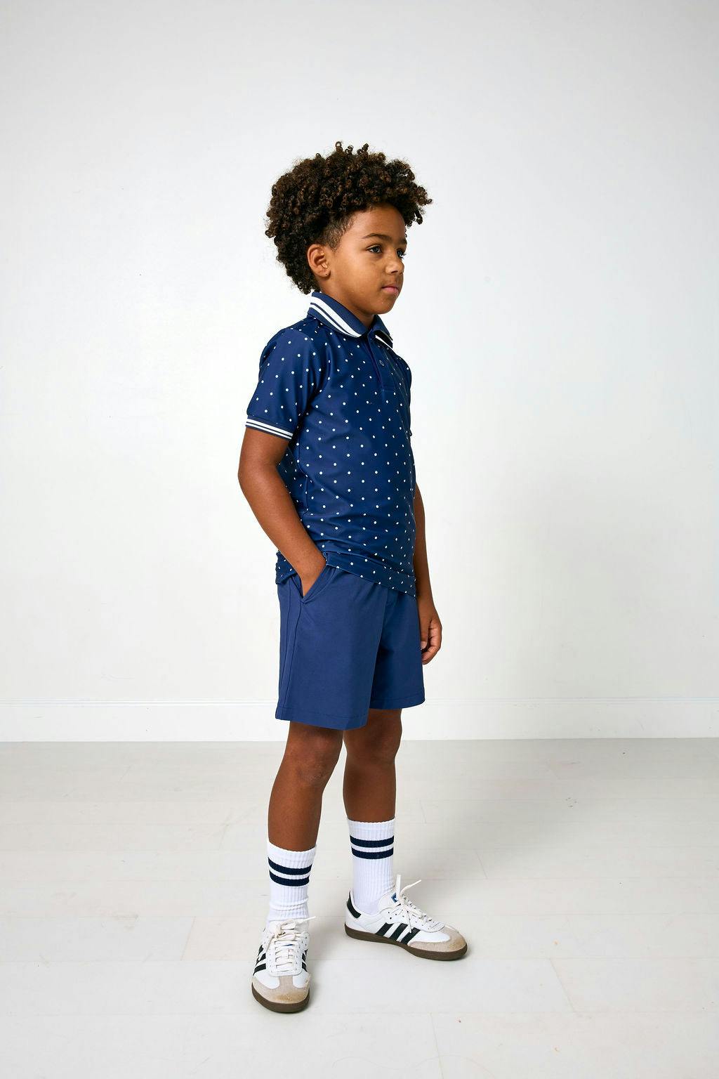 navy polka dot polo shirt