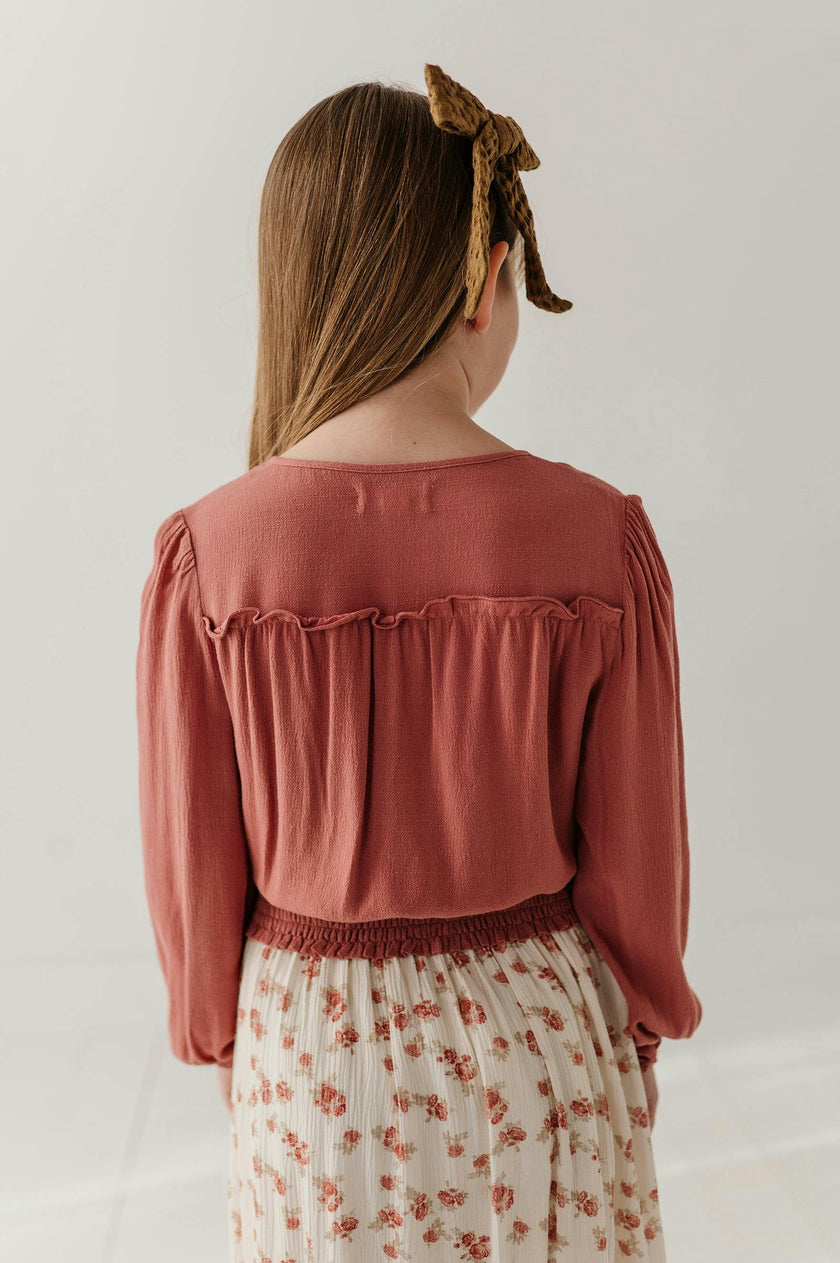 Girls Peasant Blouson Long Sleeve Top in Brick Dust