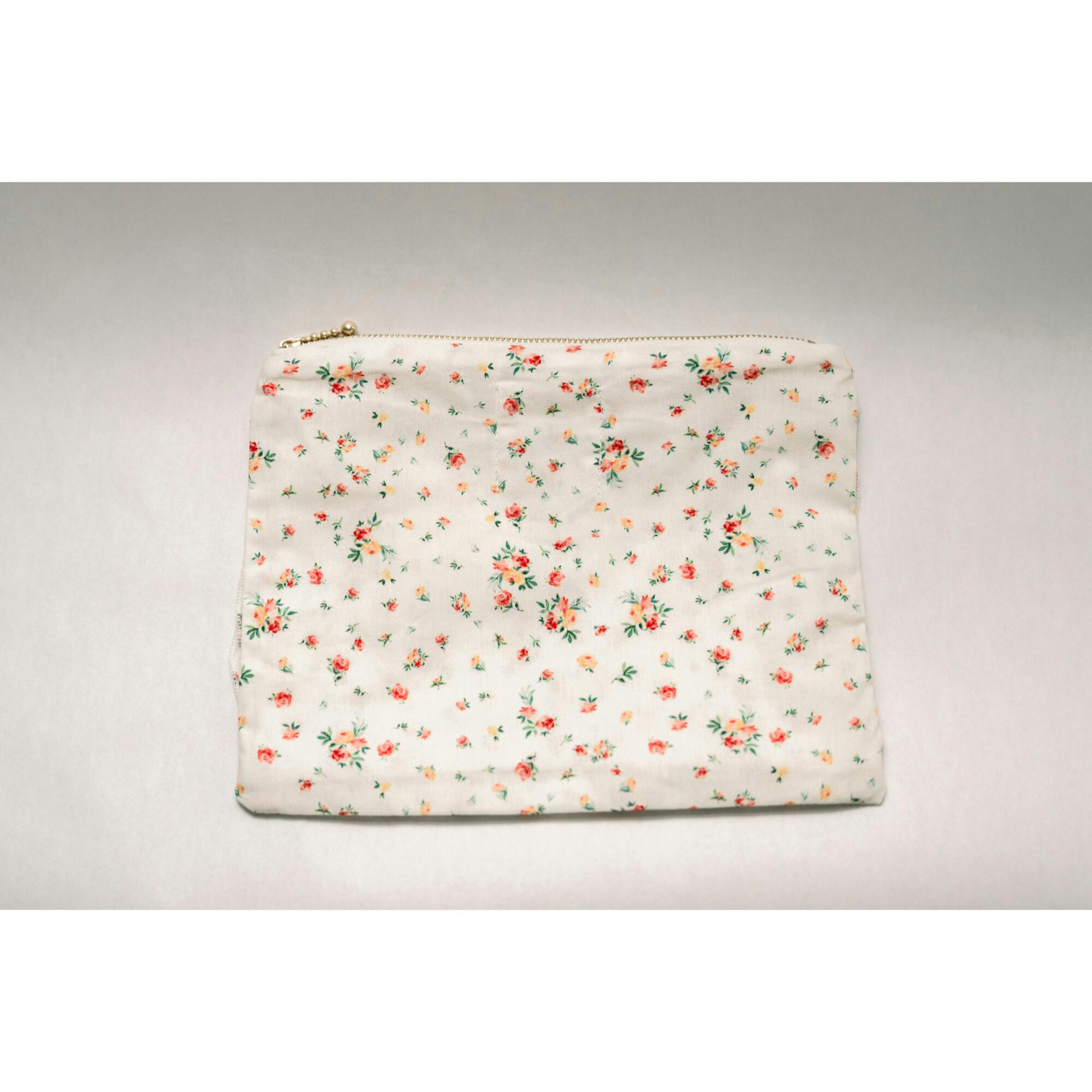 Clementine Bloom Timeless Floral Ruffle Zipper Pouch