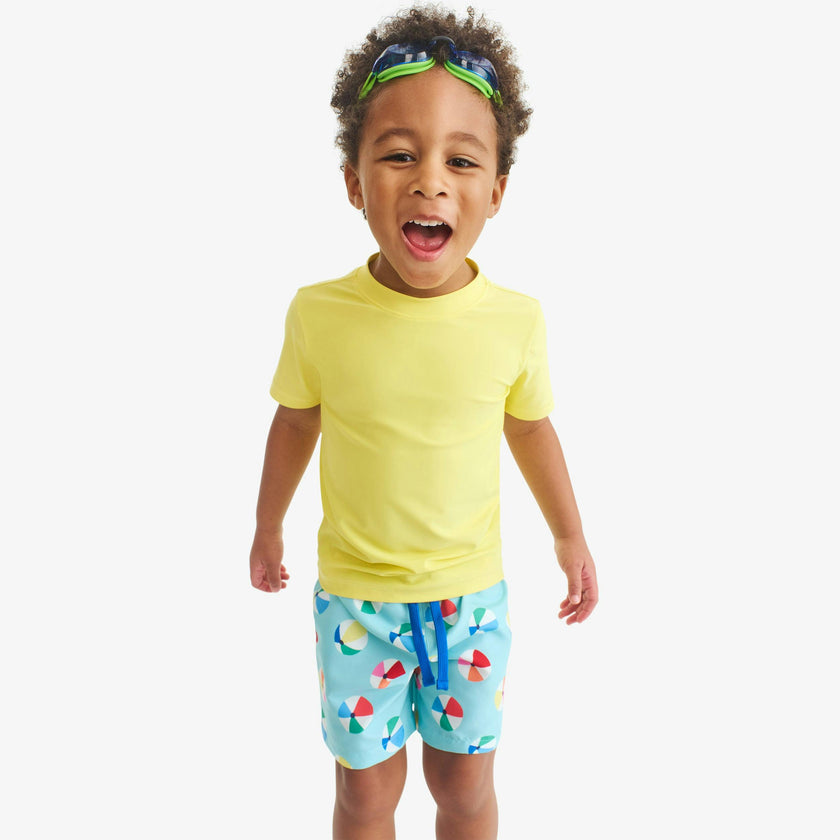 Kids swim trunk in beach balls
